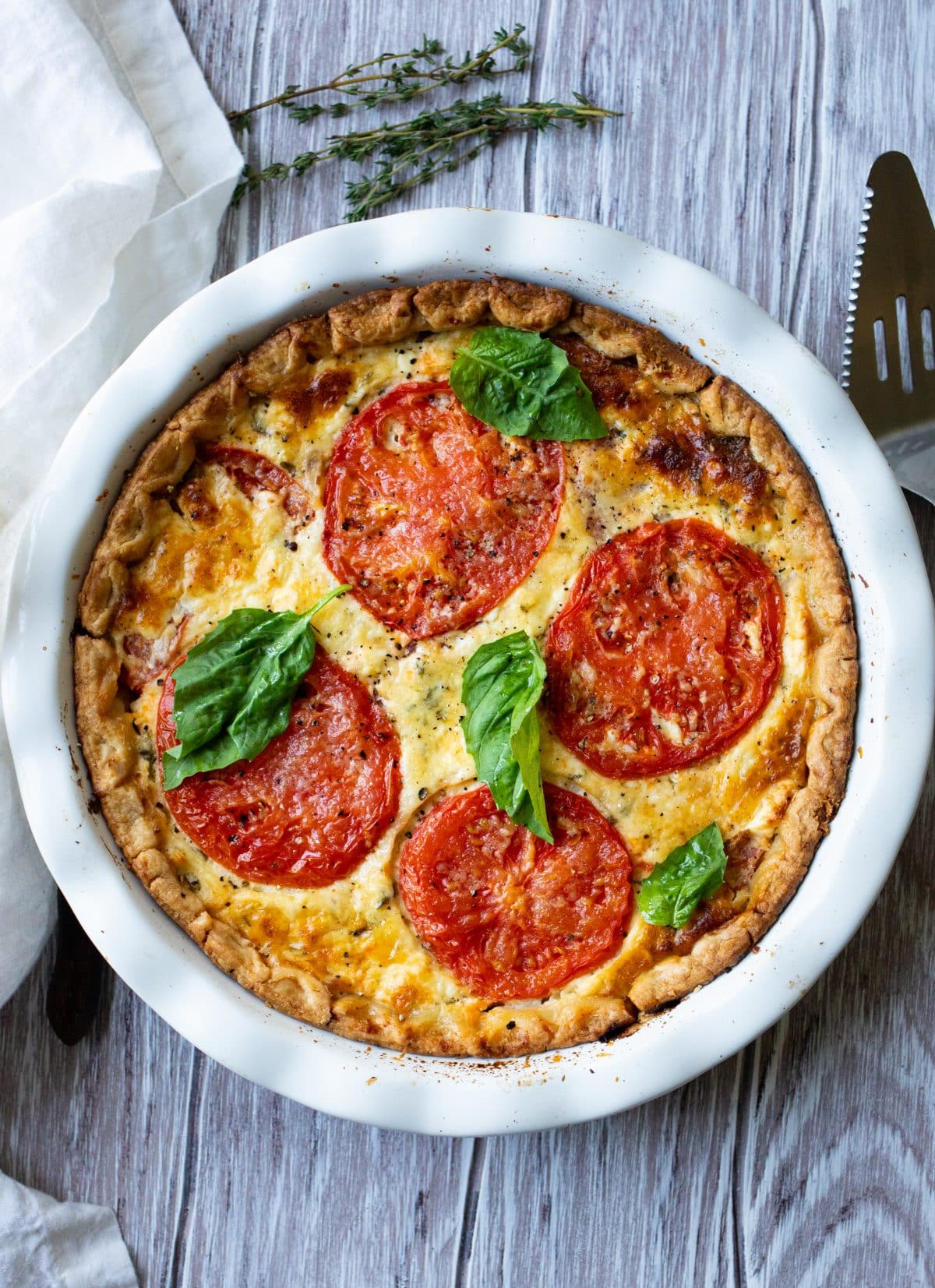 summer tomato pie on a gray table