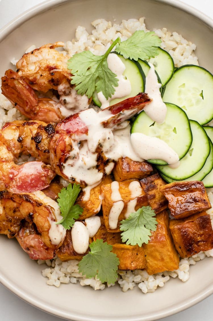 close up of shrimp, rice, and sweet potato bowl