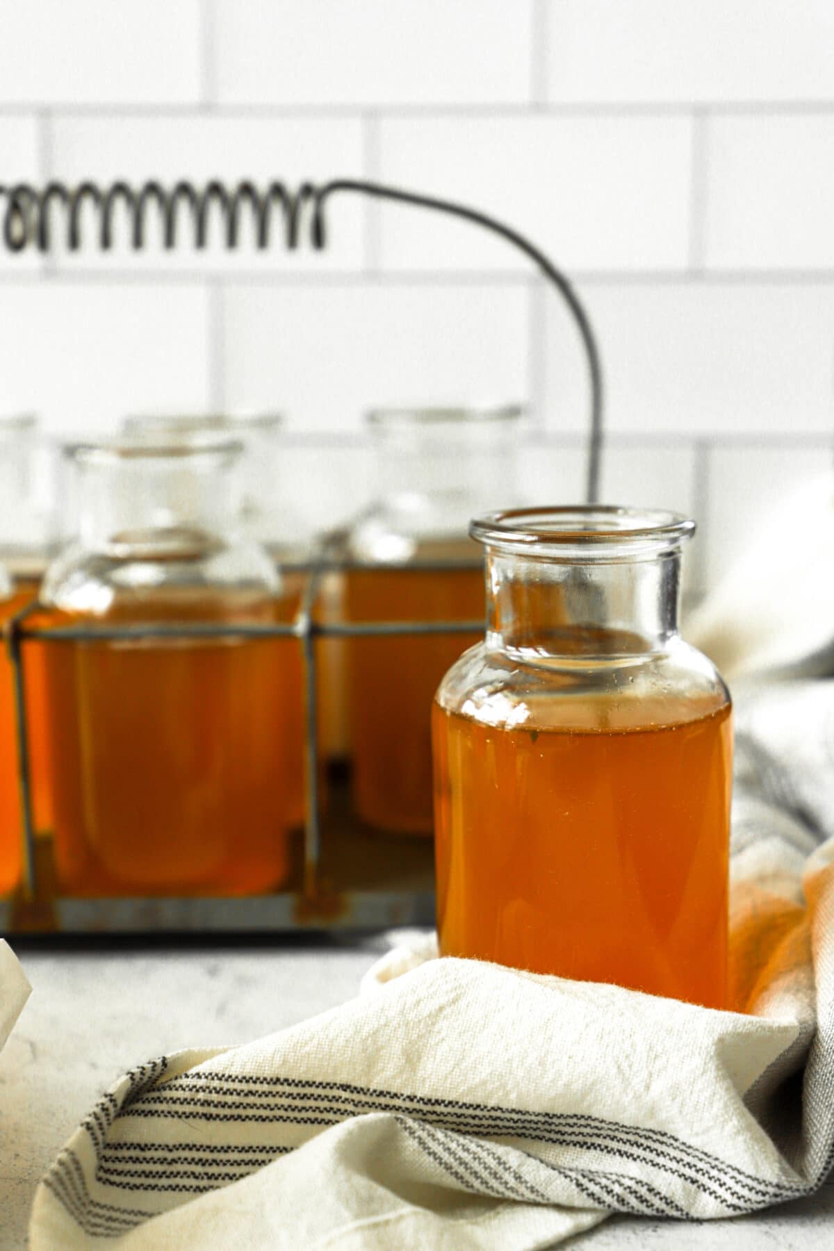 Save money and make your own kombucha at home! It's one of the best fermented foods to enjoy.