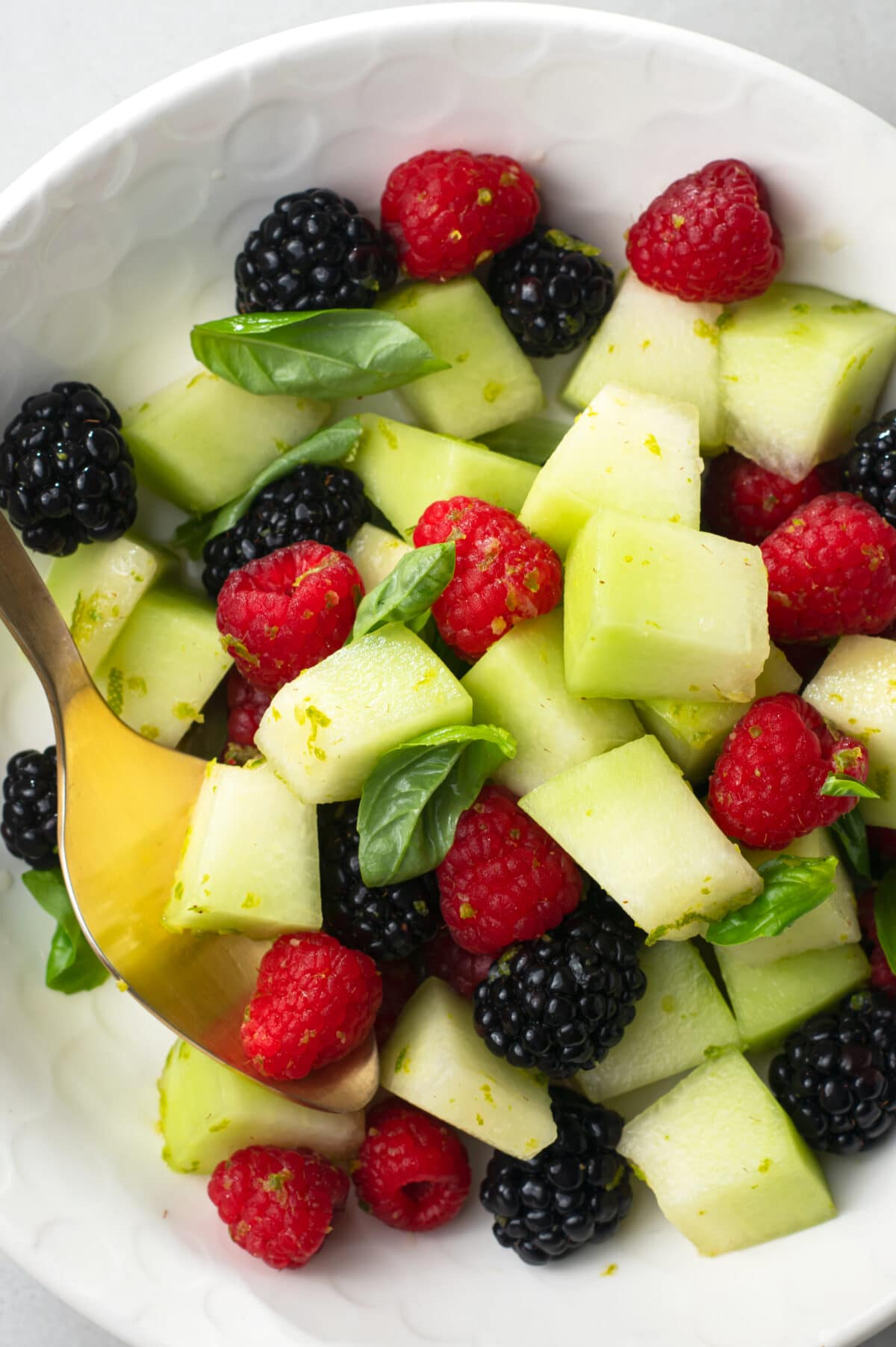 This sweet, low-calorie fruit salad is great for satisfying cravings in a healthy way!