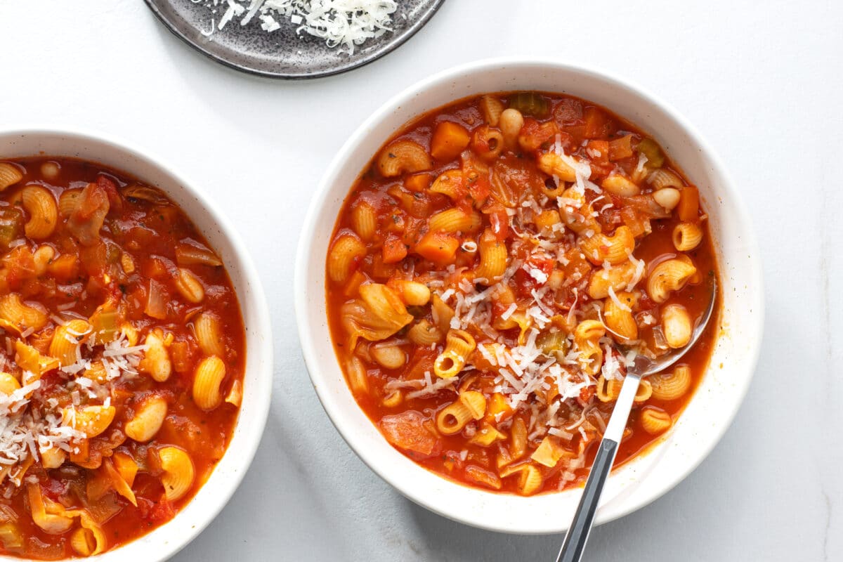 two white bowls of soup