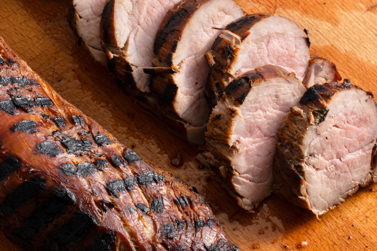 grilled pork on cutting board