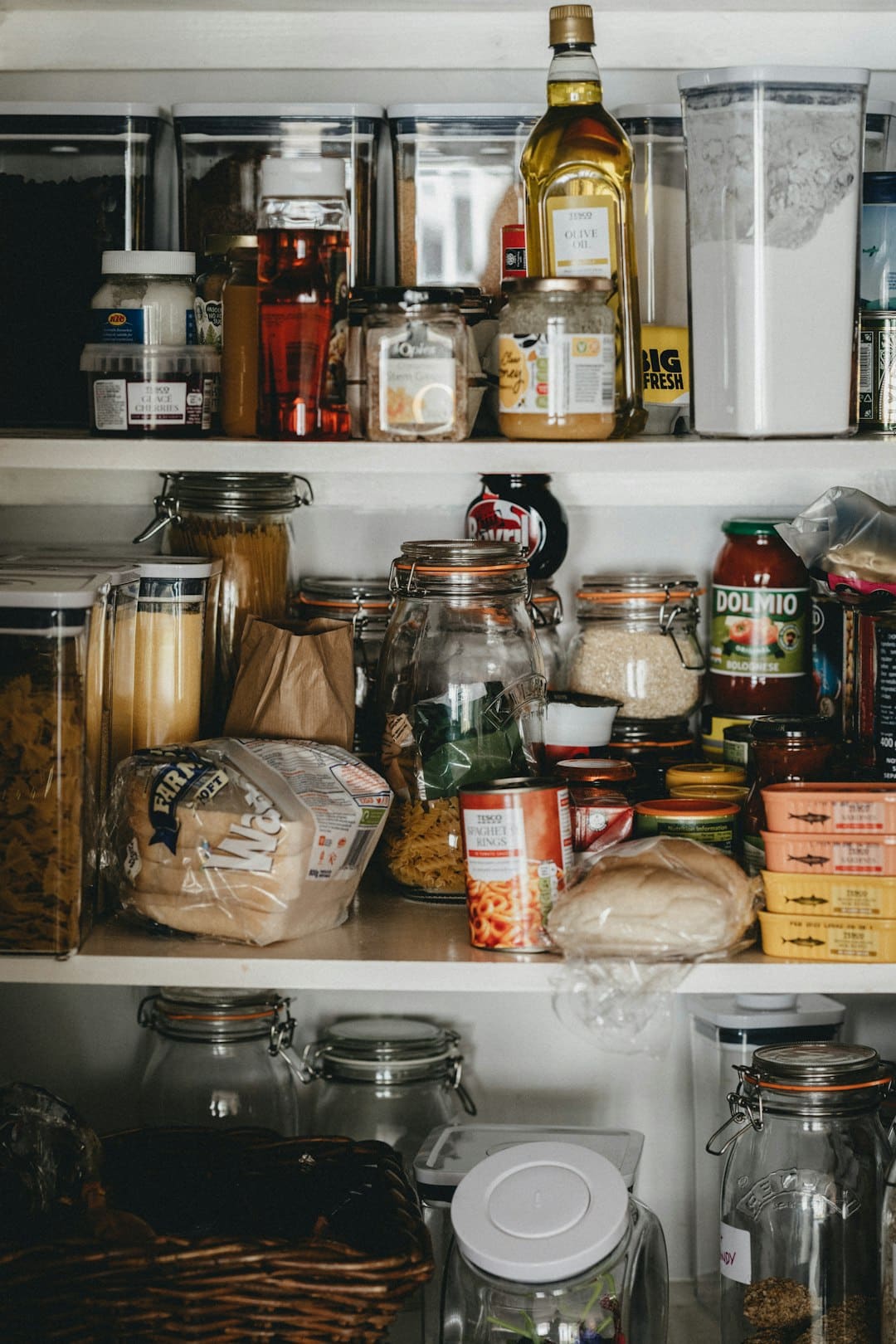 pantry full of jars and bottles