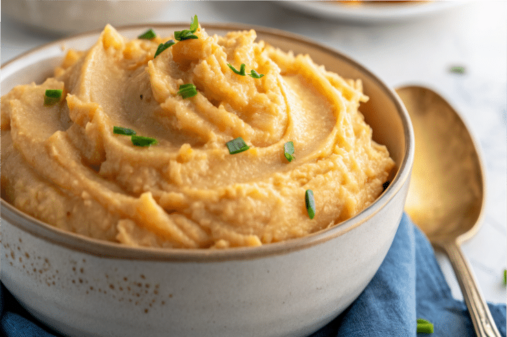 healthy sweet potato cauliflower mash side dish in a bowl