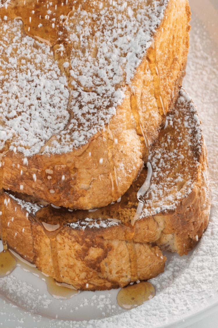 French toast on a plate with syrup